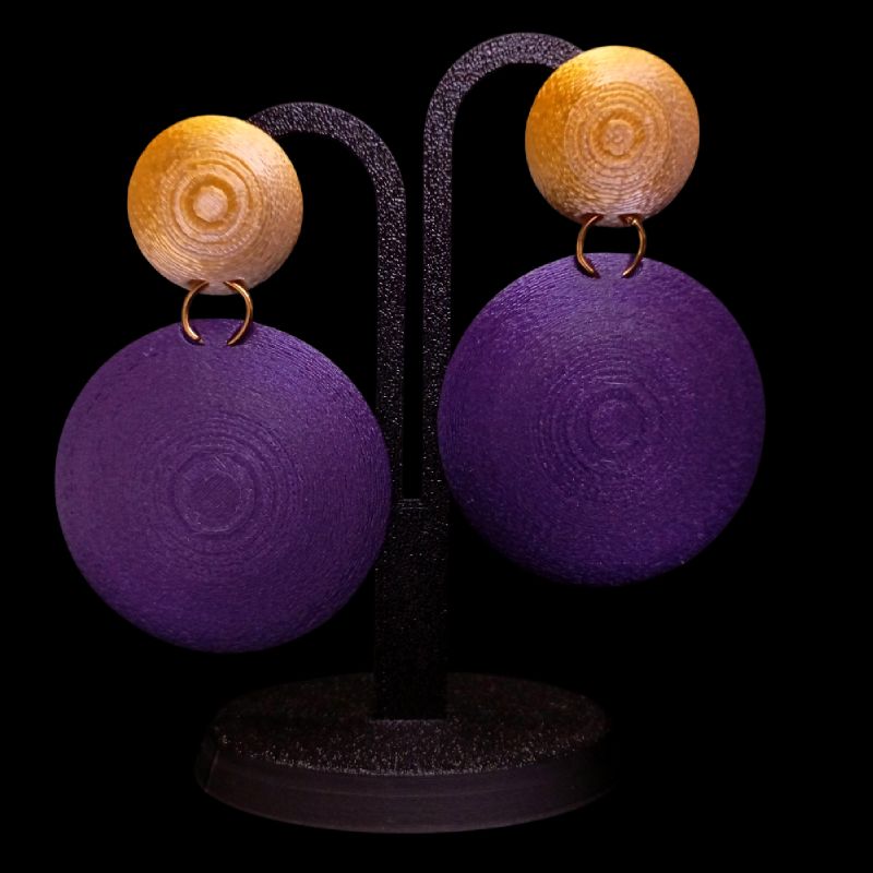 Pendientes Núcleo Purpura largos de doble disco con textura concéntrica y diseño geométrico contemporáneo