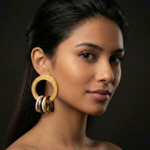 Pendientes Orbital su diseño circular evoca trayectorias cósmicas y ritmos constantes impresos en 3D de la colección de joyería sostenible Tonoto