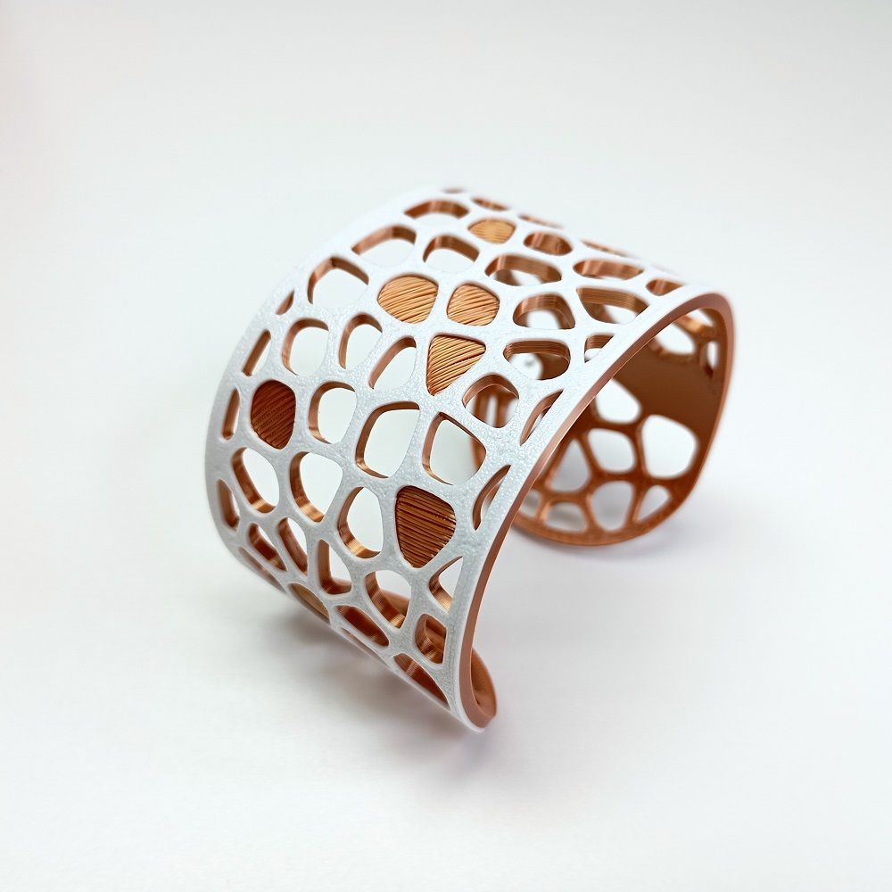 Pulsera Voronoi FW 2026 blanco cobre