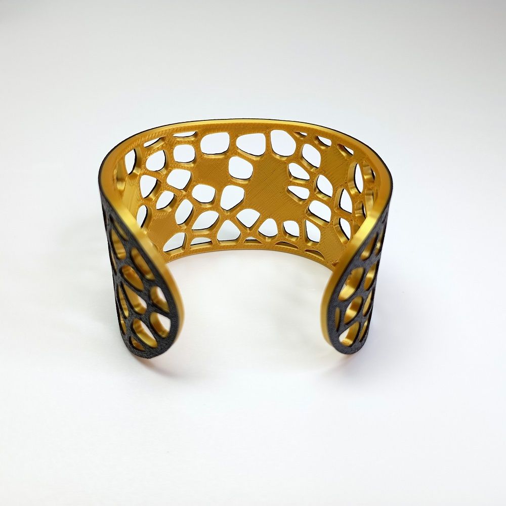 Pulsera Voronoi FW 2026 negro oro