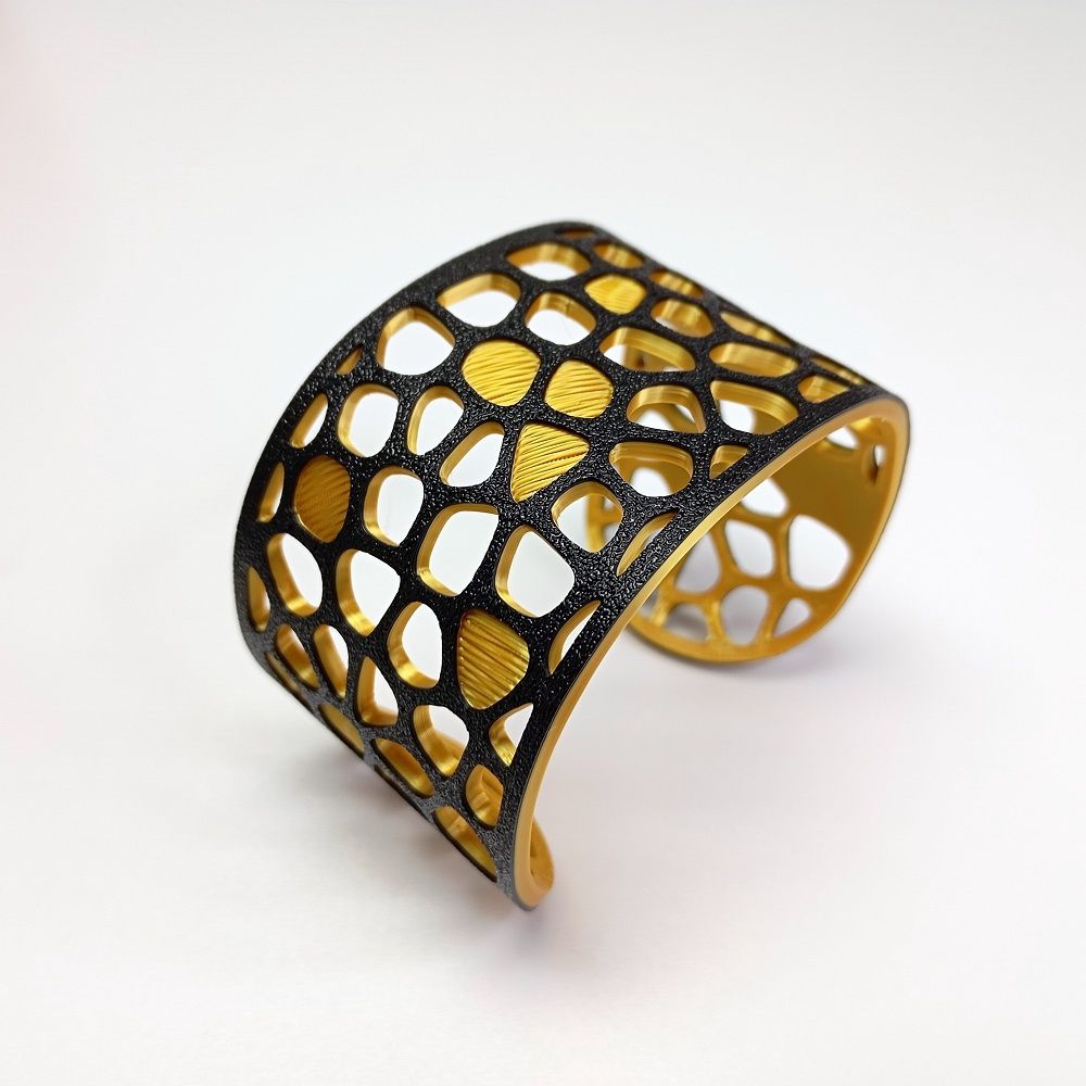 Pulsera Voronoi FW 2026 negro oro